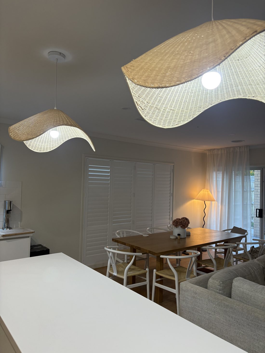Both pendant lights lighting the open-plan space