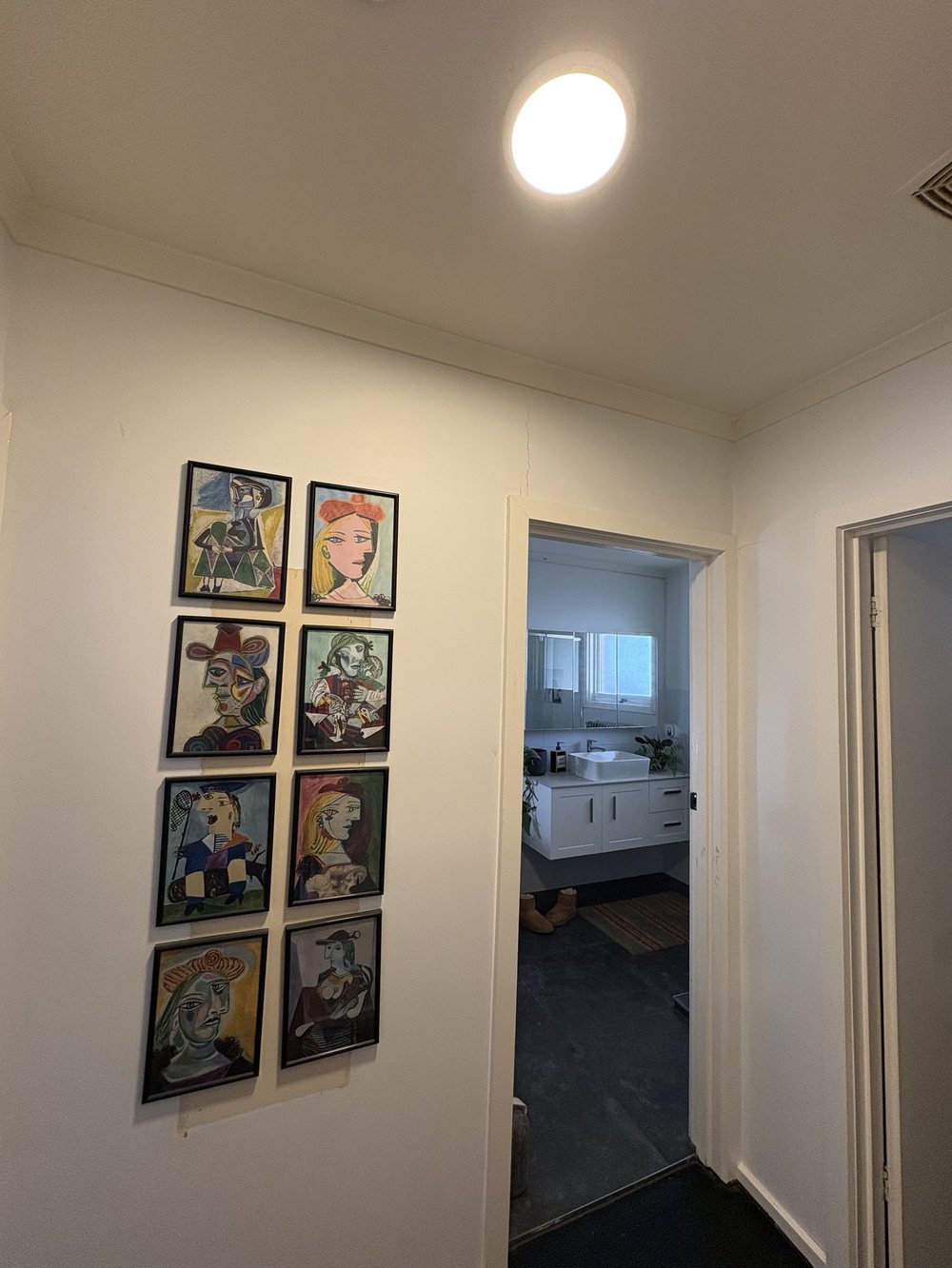 Oyster light installed in the hallway