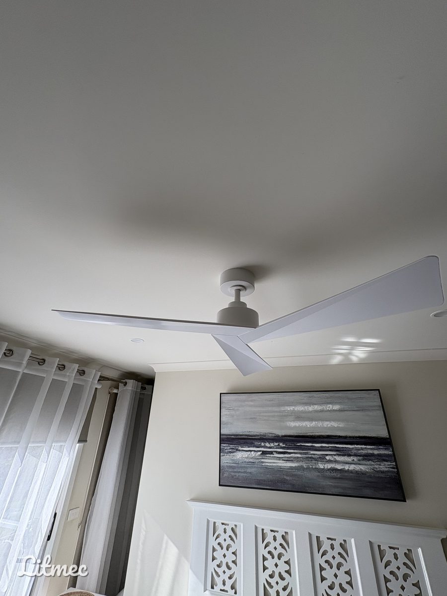 Modern white sweep-style ceiling fan installed in a Point Cook bedroom