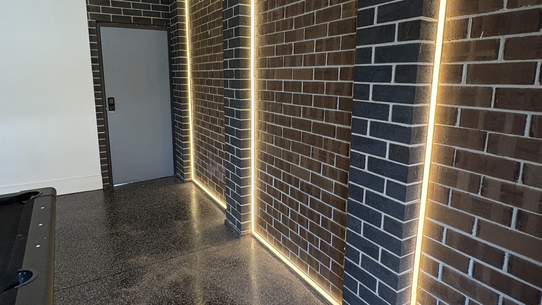 Feature LED strip lighting installed by Litmec Electrical in a commercial entry